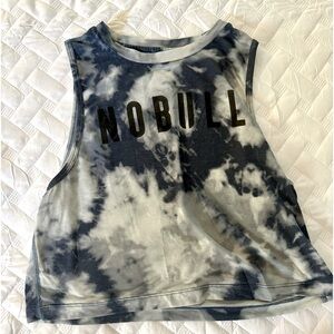 NOBULL MUSCLE TANK

Your light and airy training tank for any workout.